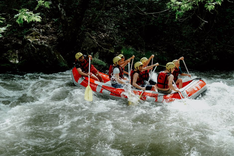 Family rafting on a whitewater river
