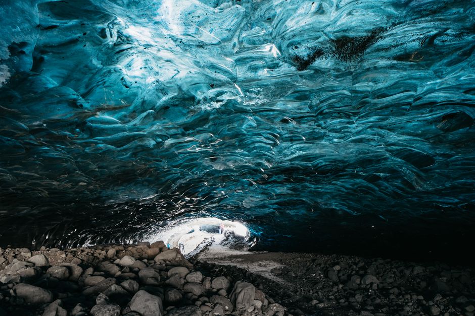 Captivating view inside an ice cave showcasing beautiful icy formations.