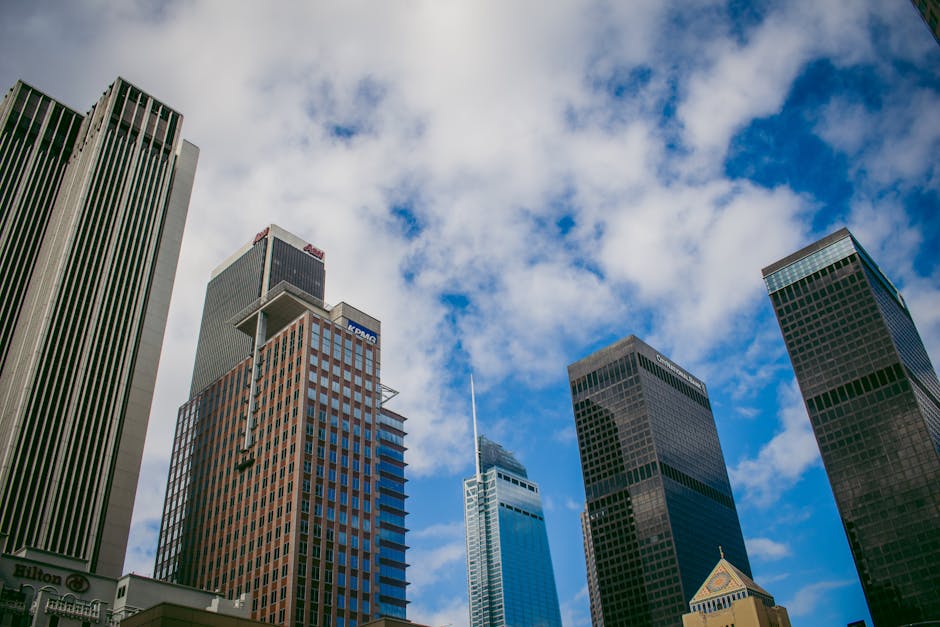 Low angle view of modern skyscrapers against a blue sky in downtown Los Angeles.