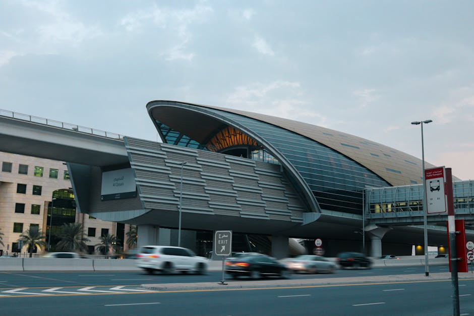 A striking view of a modern metro station in Dubai, capturing urban transport and architecture.